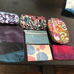 8 cosmetic bags in assorted styles all w/ zippers